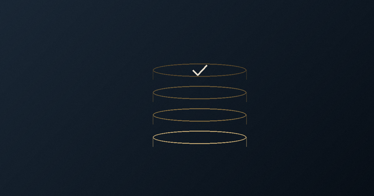 Stacked backup disks with a checkmark, illustrating tested backups
